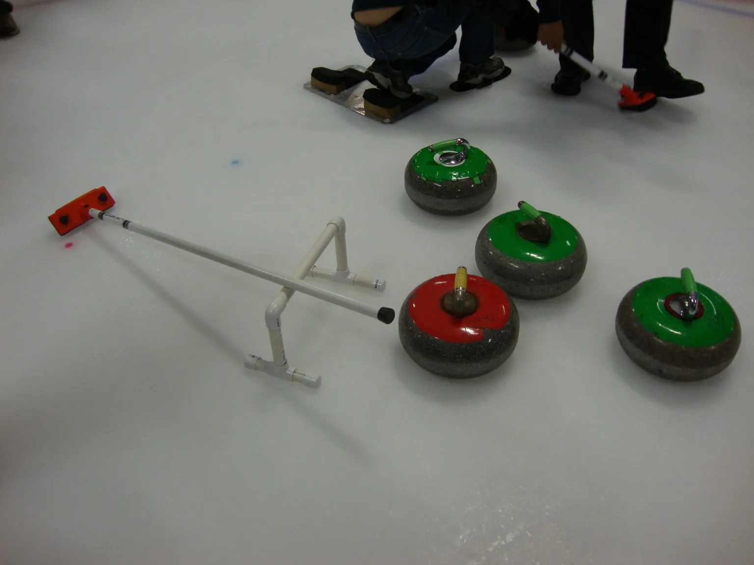 Curling – an indoor winter stag activity near Riga