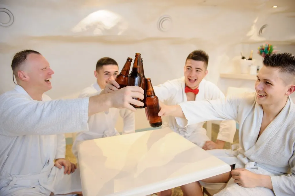 Group of lads relaxing with beer