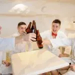 Group of lads relaxing with beer