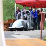 Riding the modified summer bobsleigh